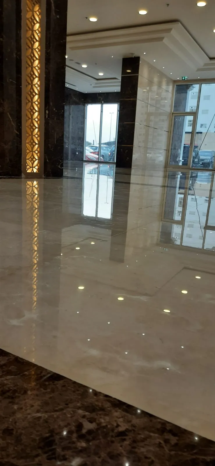 Restored hallway and kitchen marble floor in an Al Wasl family villa
